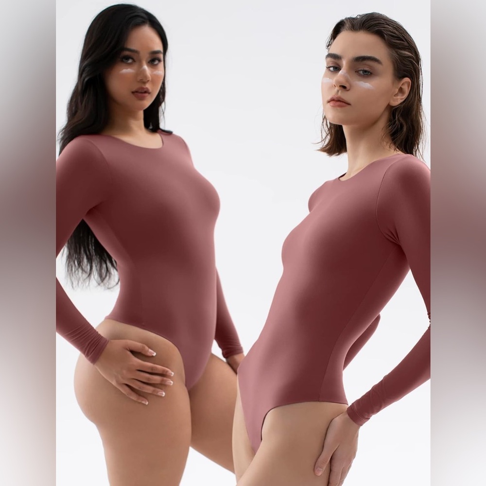 PUMIEY Crew Neck Long Sleeve Thong Bodysuit in rose mauve color